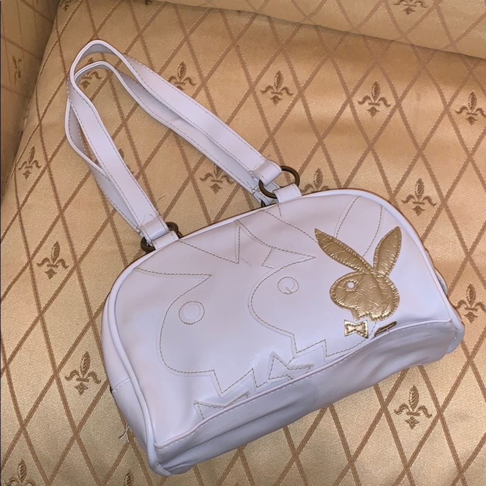 White and gold playboy purse